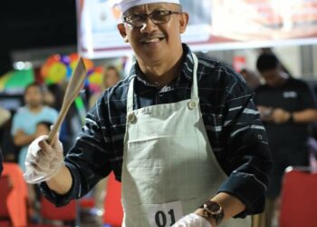 Pj Walikota Kotamobagu Ikut Lomba Masak Nasi Goreng