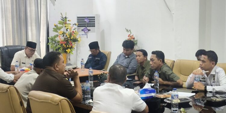 Pimpin Rapat TKDD Boltim, Hendra Tangel Tegaskan Penertiban WNA