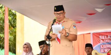 Mewakili Bupati Boltim, Asisten 1 Hendra Tangel Buka Kegiatan Lomba Gerak Jalan Tingkat Pelajar