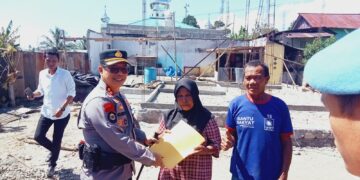 Langkah Nyata AKBP Golfried Hasiholan Ringankan Beban Warga Pasca Musibah Kebakaran di Modayag