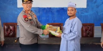 Peduli Korban Banjir, AKBP Golfried Hasiholan Serahkan Bantuan ke Warga Paret
